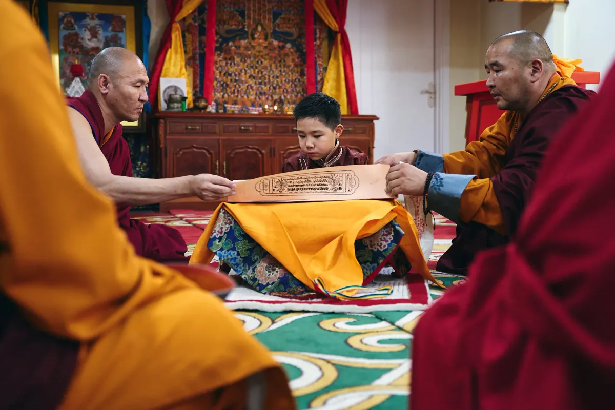 An 8-year-old boy is at the heart of a fight over Tibetan Buddhism