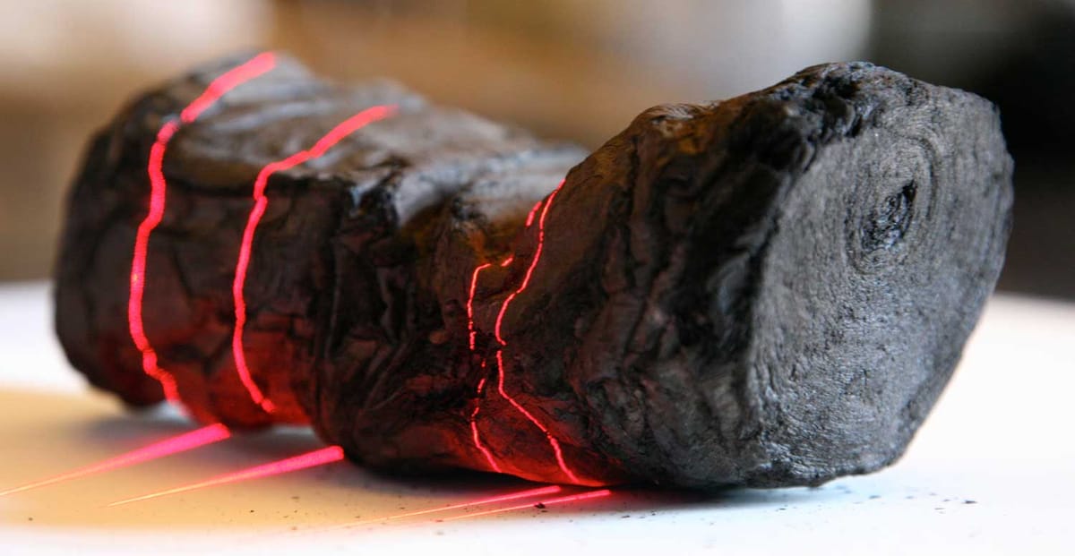 Researchers use AI to read a scroll burned by Vesuvius